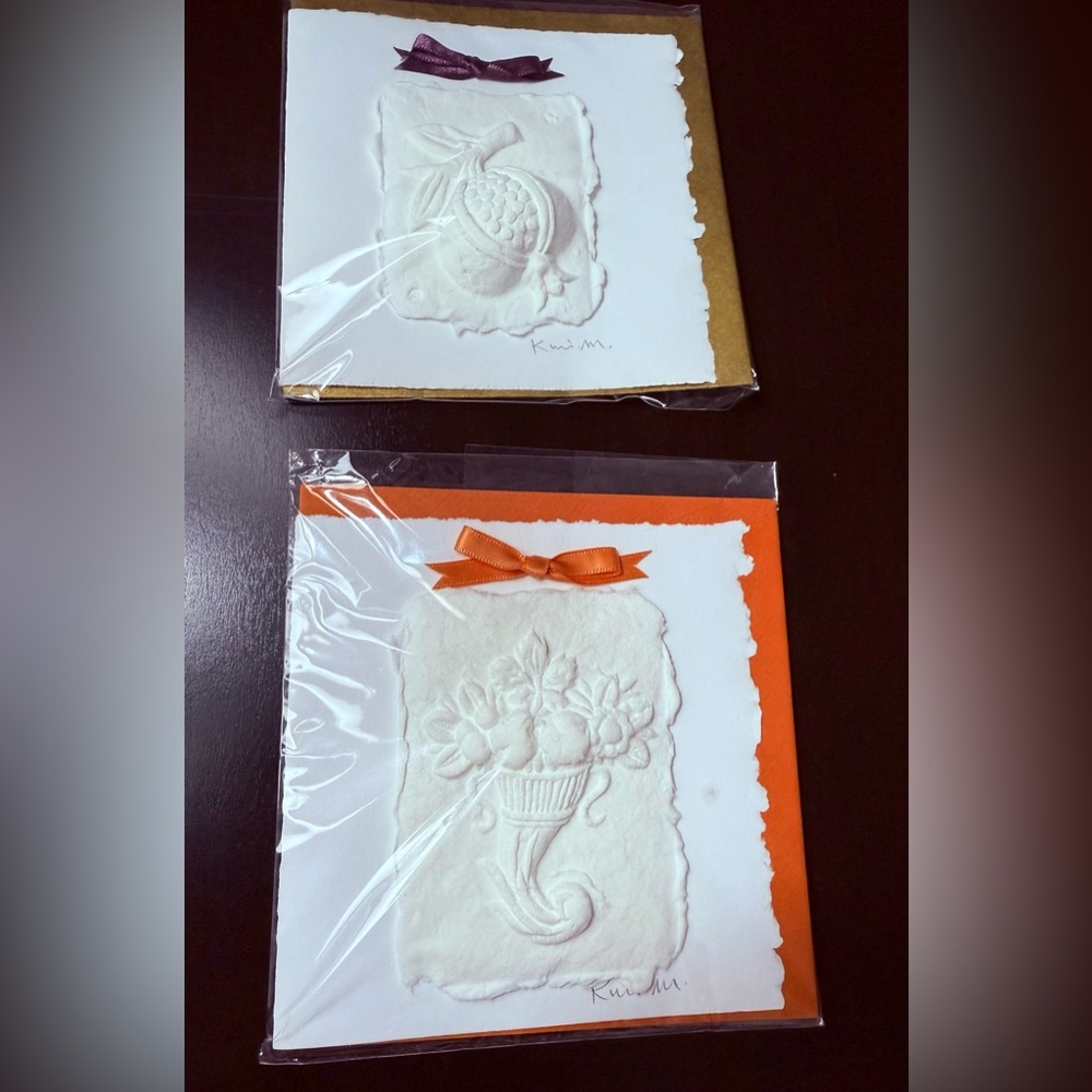 A Set of Two Handmade Elegant Embossed Art Cards with Bows